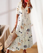 Klänning med blommönster och v-ringning